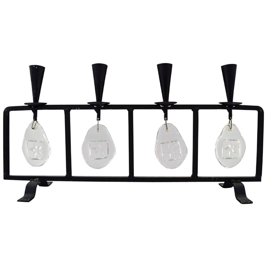 Erik Höglund for Kosta Boda, Candleholder in Cast Iron with Mouth Blown Glasses For Sale
