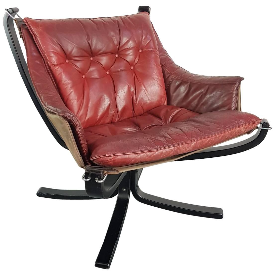 Low Back Winged Chestnut Brown Leather Falcon Chair Designed by Sigurd Resell For Sale