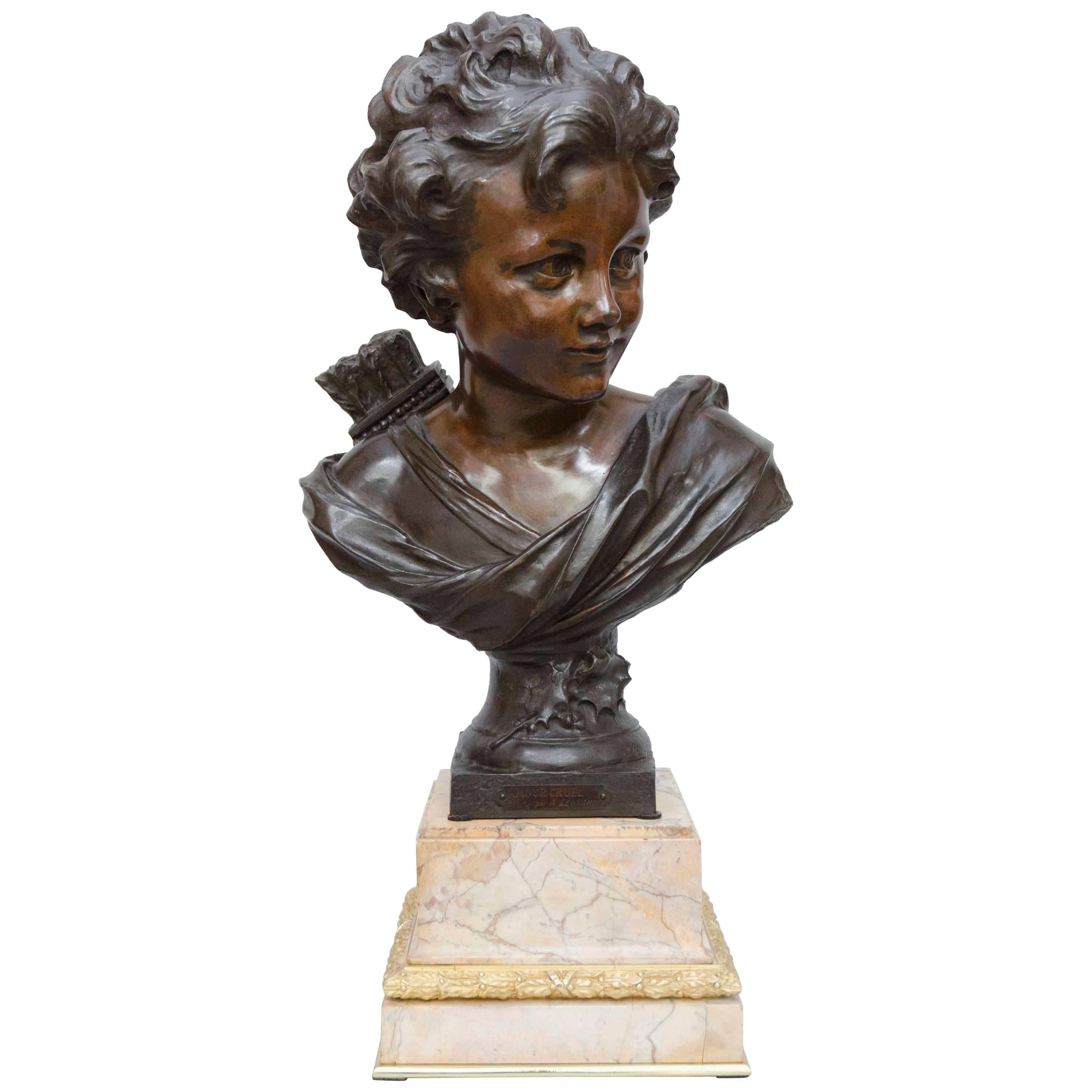 French Art Nouveau Bronze Bust of "Amour Cruel" by Agathon Leonard For Sale
