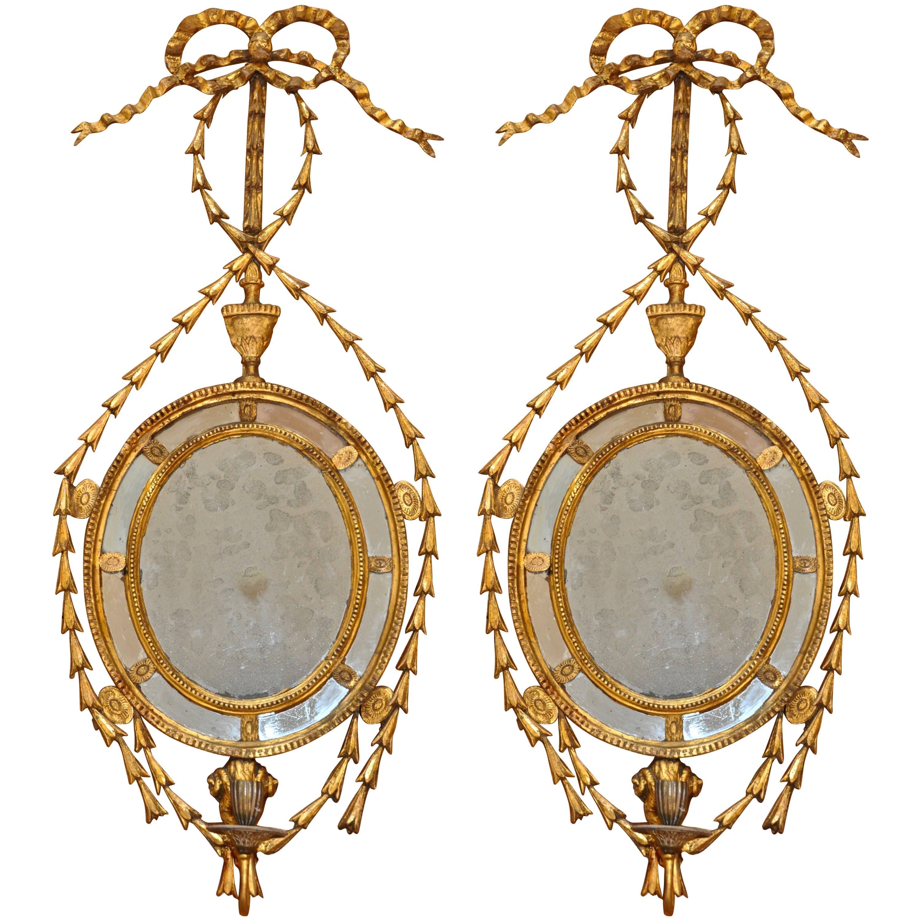Pair of Period Gilt Adam Mirrored Sconces with Ram's Head Motif and Candle Arm