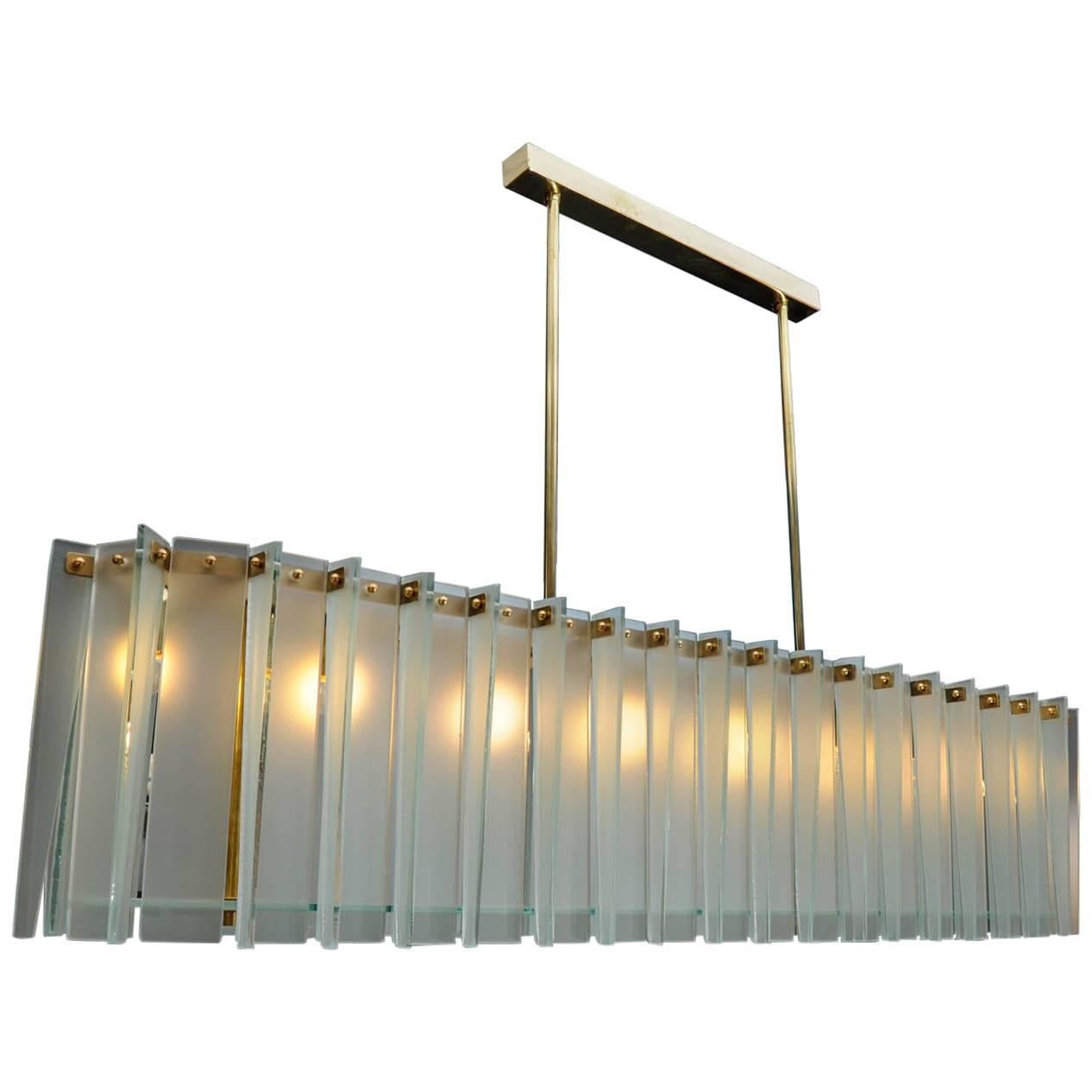 Long Brass and Frosted Glass Glustin Luminaires Creation Chandelier For Sale