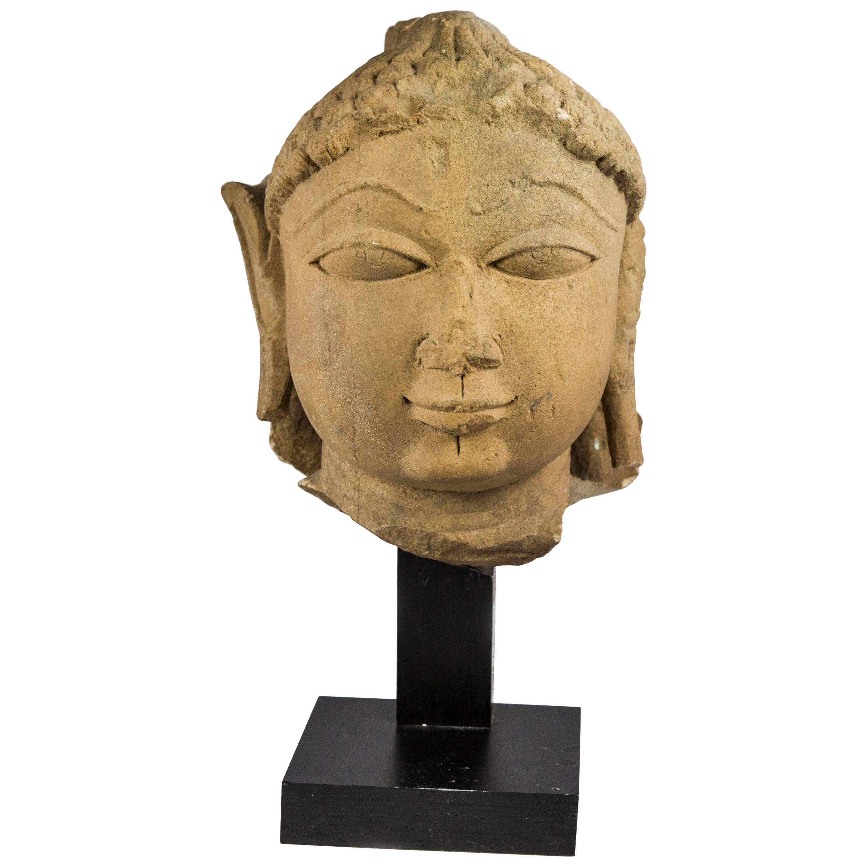 11th Century Yellow Sandstone Indian Head of Buddha Statue For Sale