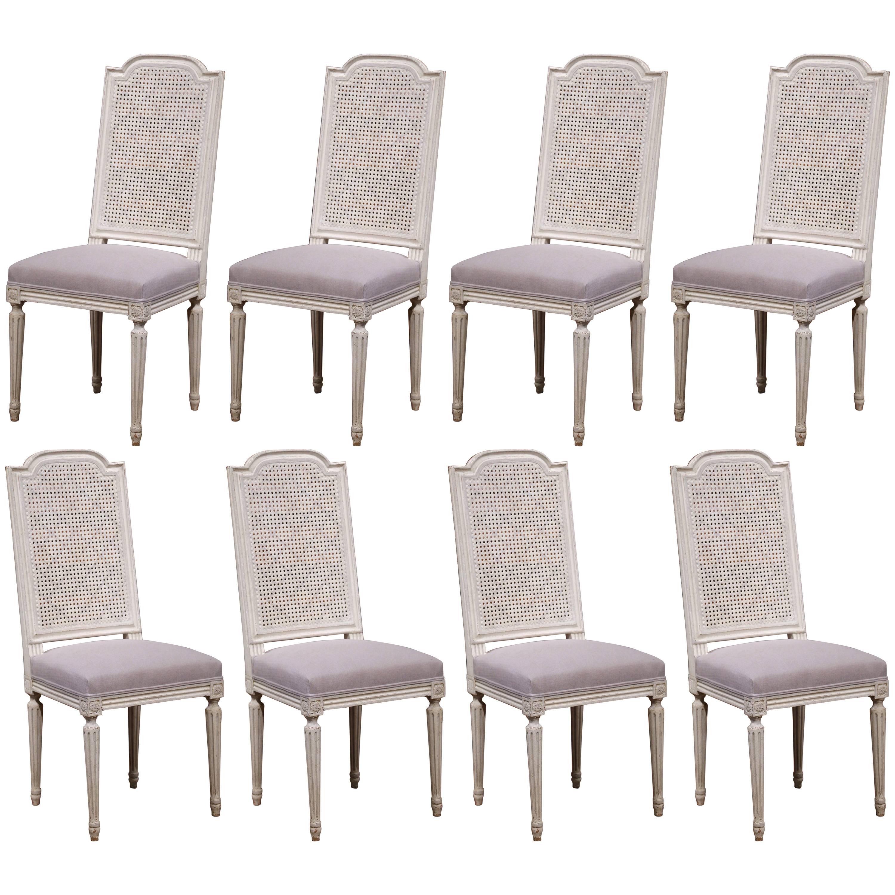 19th Century French Set of Eight Louis XVI Painted Dining Chairs with Cane Back