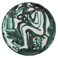 Robert Picault Assiette en céramique « Joueur de flûte », 1950