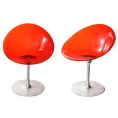 Pair of Philippe Starck "Eros" by Kartell Red Italian Lucite Swivel Chairs