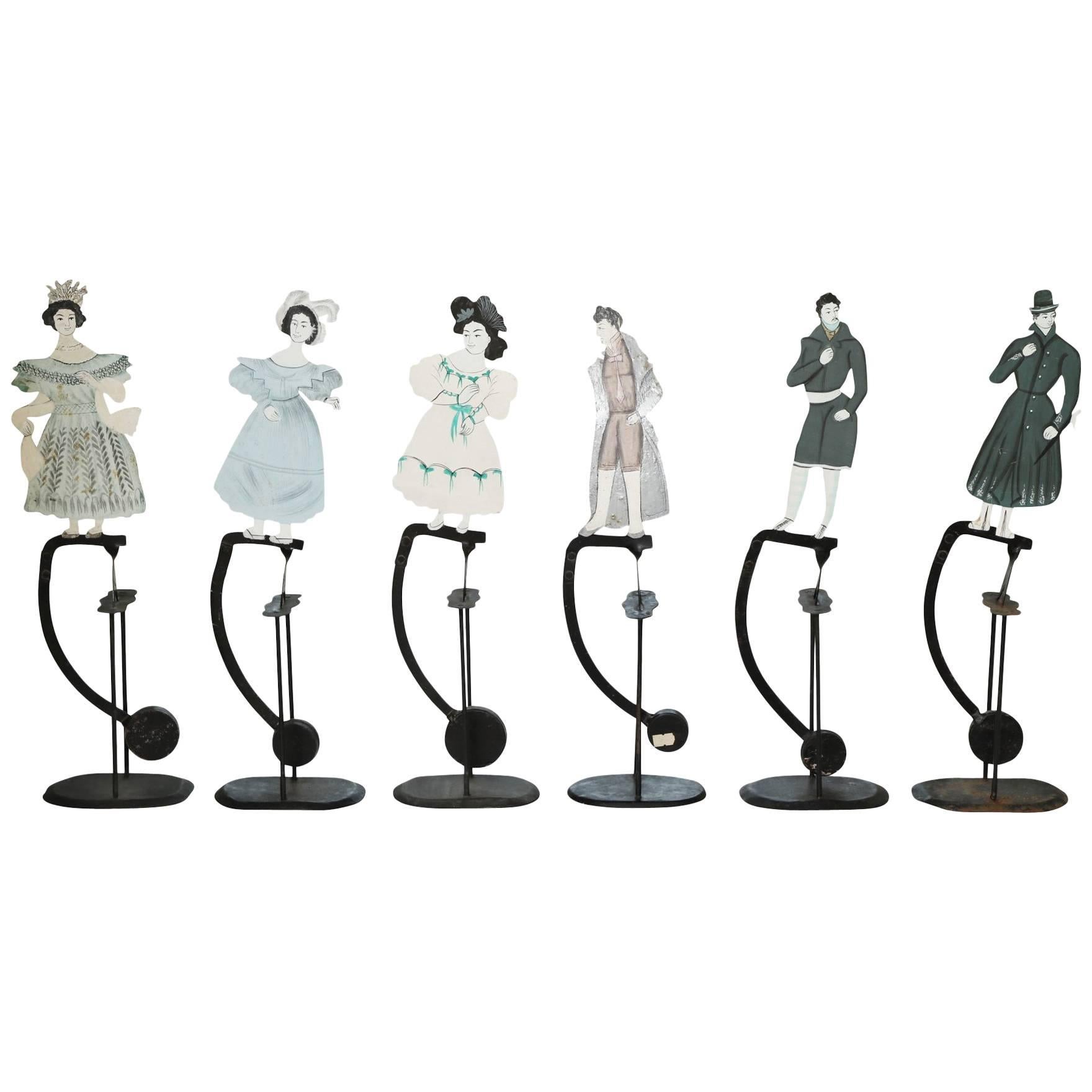 Set of Six Decorative Silhouettes in Motion on Stands