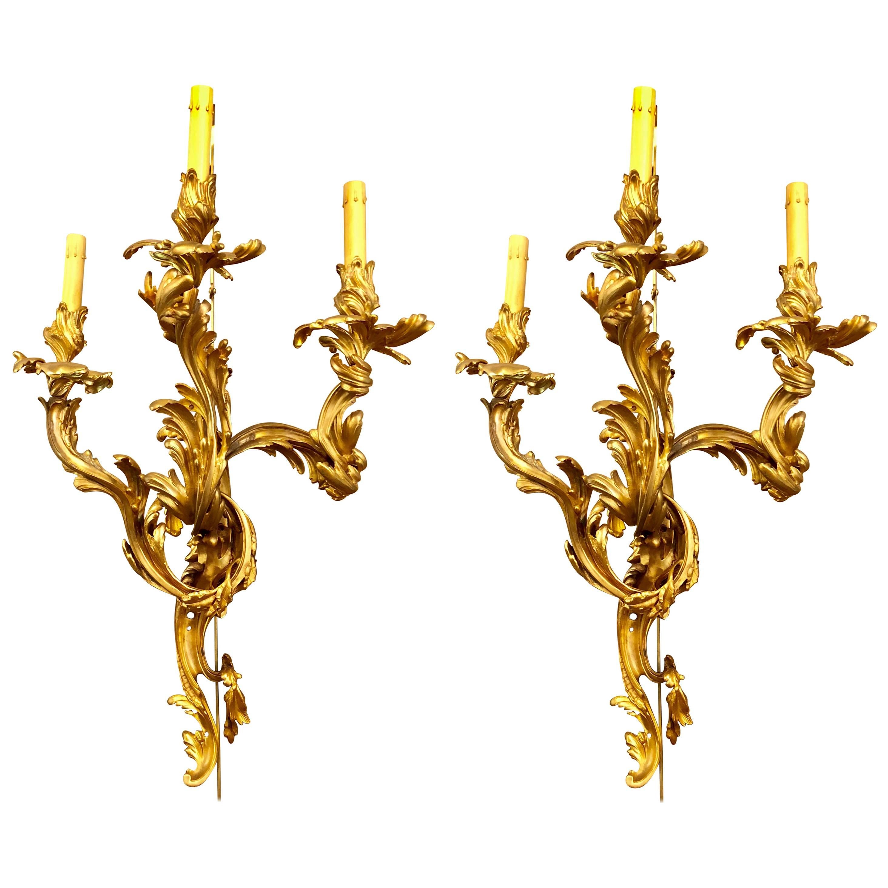 Pair of Louis XVI Style Bronze Three Light Gilt Bronze Sconces