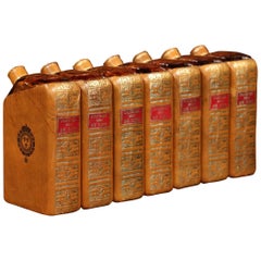 Vintage Mid-20th Century French Set of Seven Glass Bottles Shaped as Leather Bound Books