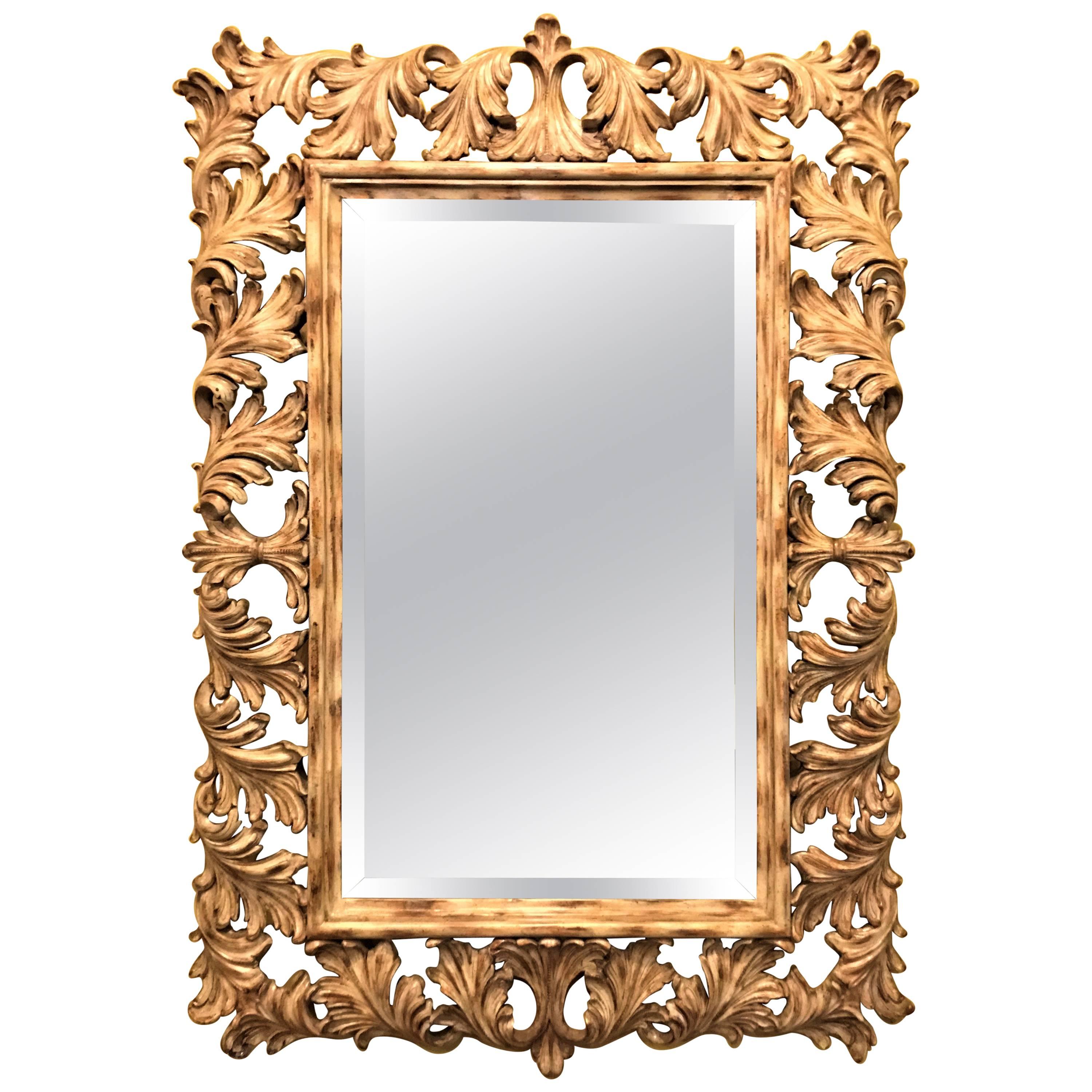 Heavily Carved French Frame Flanking a Bevelled Glass Wall or Console Mirror For Sale