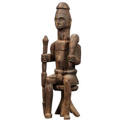 Antique Large Tribal Seated Igbo Ikenga Figure with Sword, Early 20th Century, Nigeria