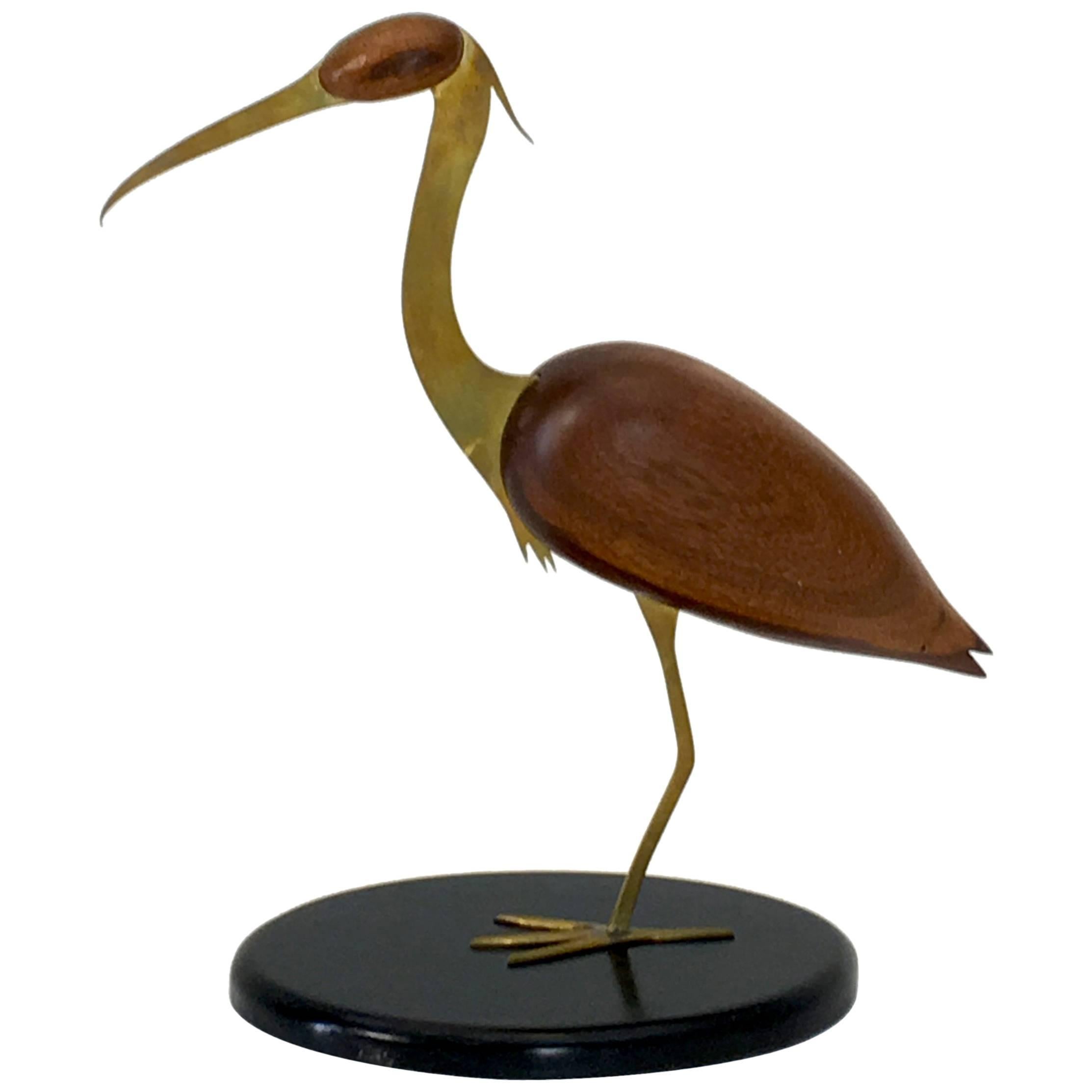 Crane brass and walnut table top sculpture by Bill Scott For Sale