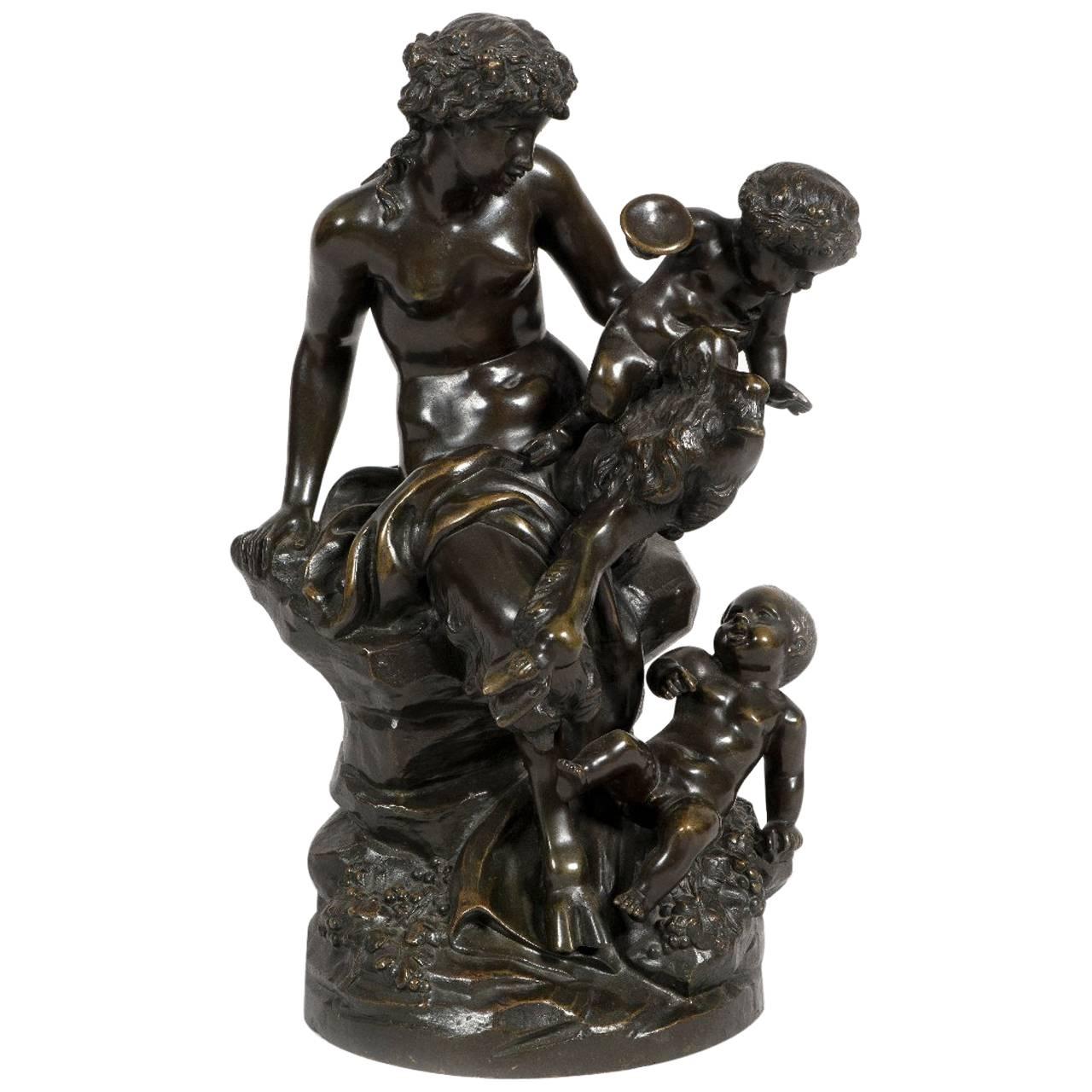 Groupe figuratif de style Rococo en bronze patiné d'après Clodion