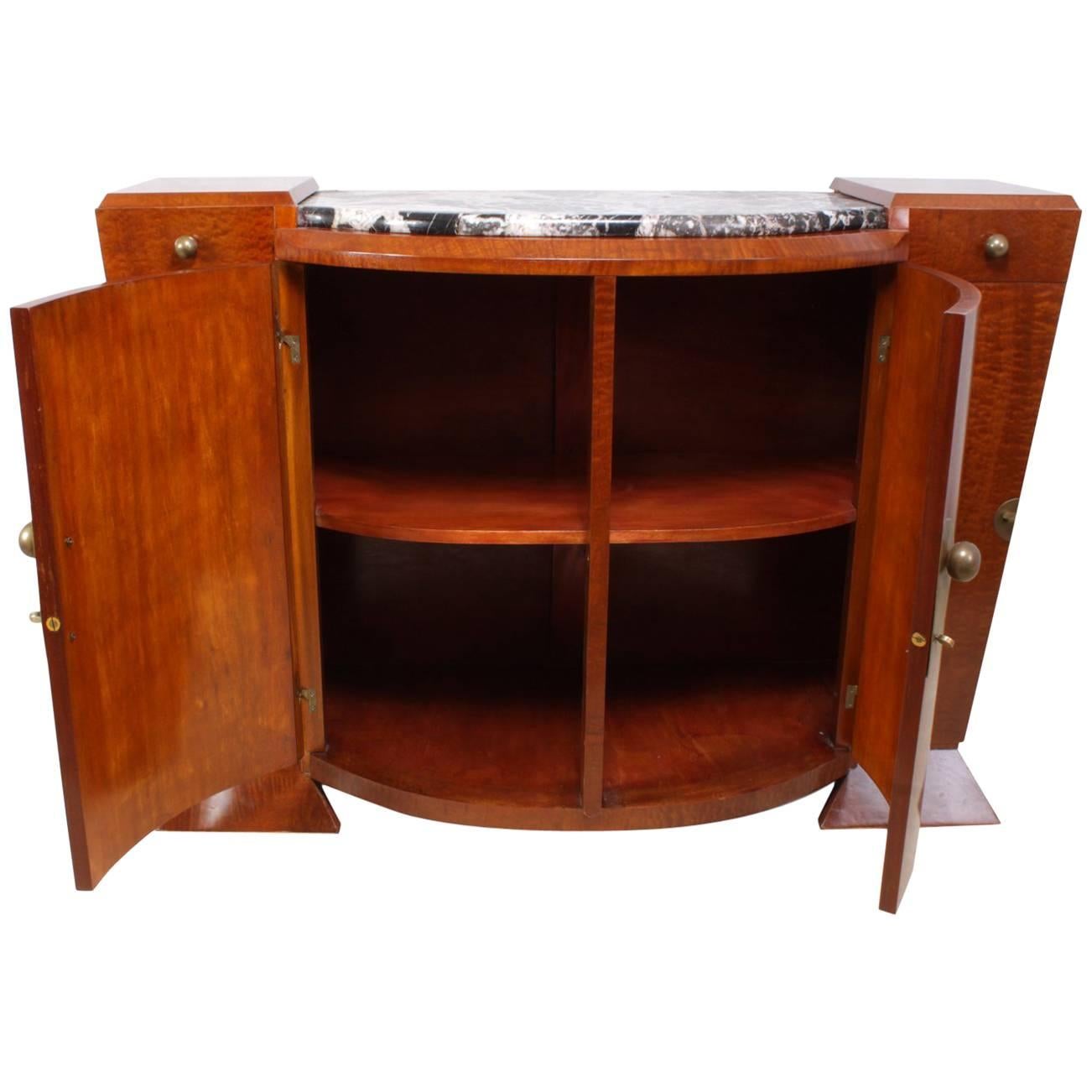 Art Deco Sideboard French c1920
a very french flamboyant shaped Art deco sideboard with bowed central doors and a marble top, the outside cupboards and drawers are fixed and do not open, the sideboard has been fully restored and hand polished and is