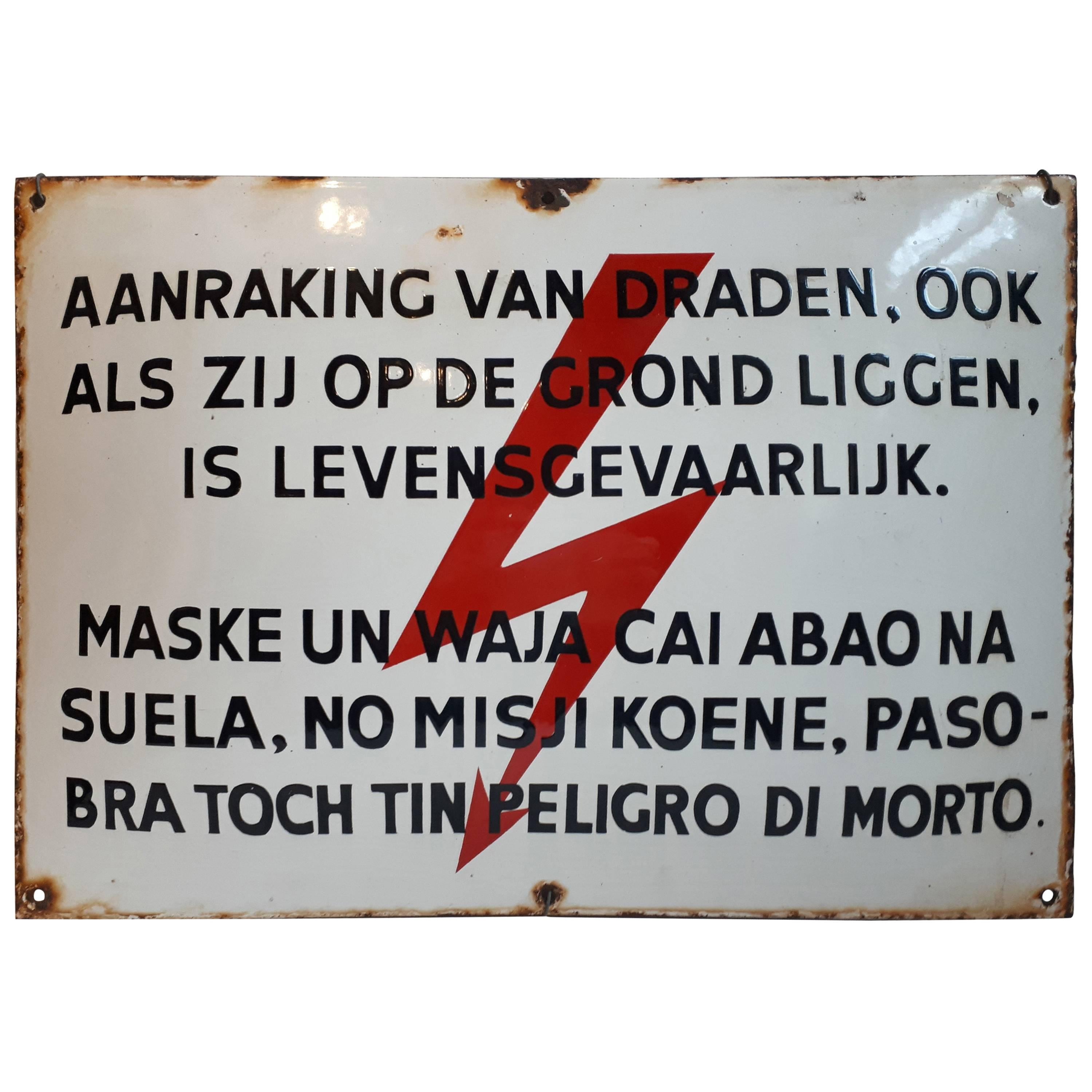 Warnungsschild aus Emaille in Niederländisch und Papiamentu / Papiamento Sprache