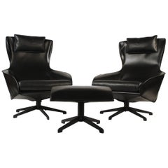 Ein Paar Mario Bellini Modell 423 Cab Lounge Sessel mit drehbarem Ottoman von Cassina