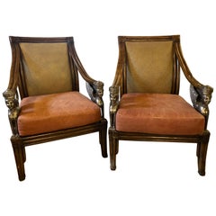 Custom Quality Pair Rattan Armchairs Each with Full Bodied Silver Gilt Sphinxes