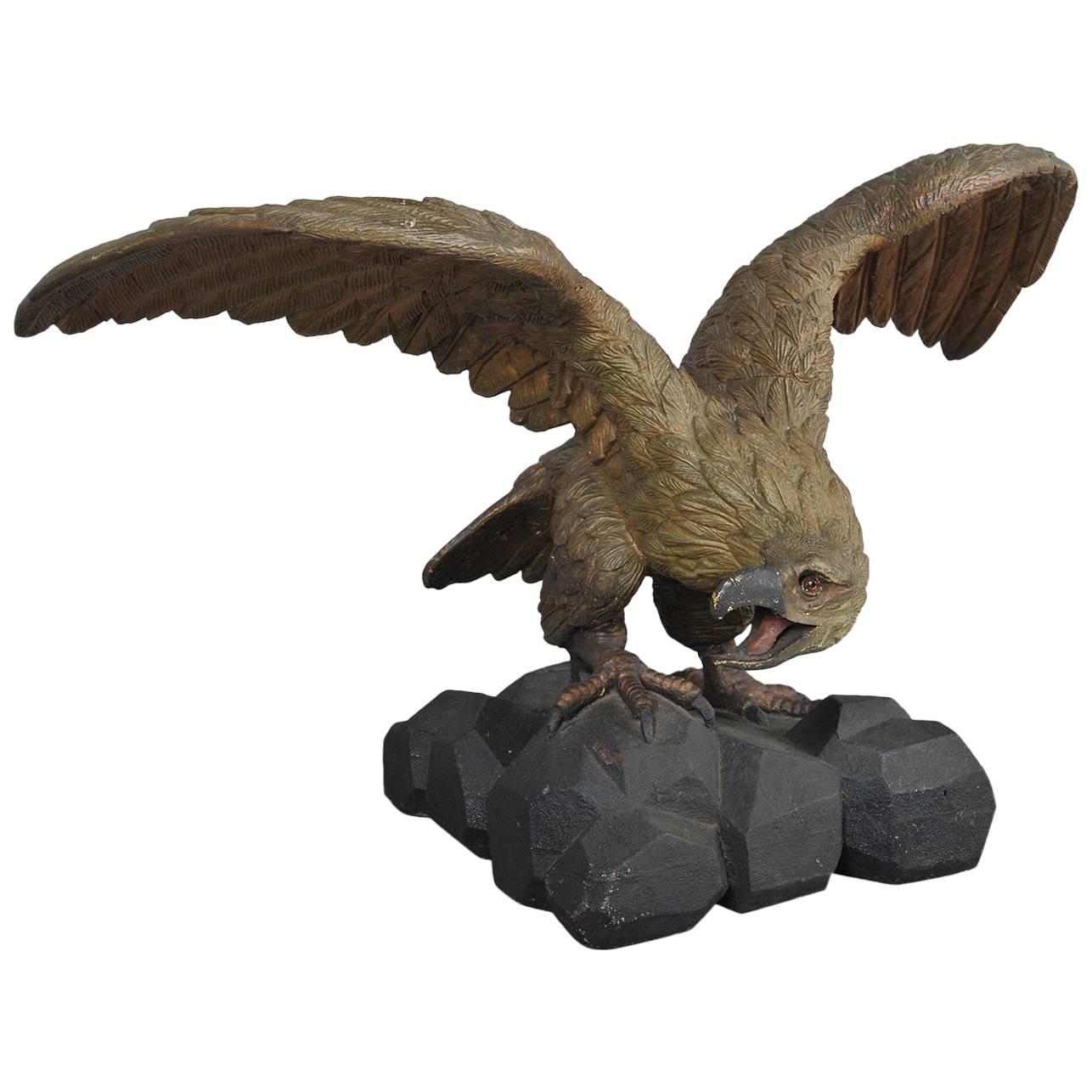 Carved Eagle with Outstretched Wings Perched on Rocks