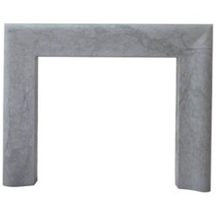 Bolection Fireplace in Carrara Marble