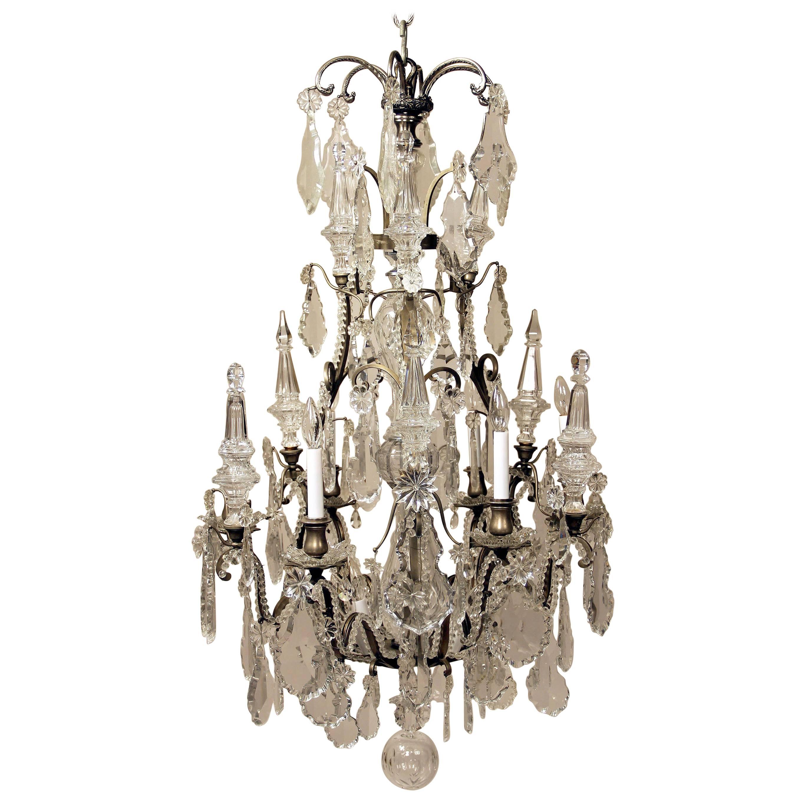 Late 19th Century Silvered Bronze and Baccarat Crystal Twelve-Light Chandelier For Sale