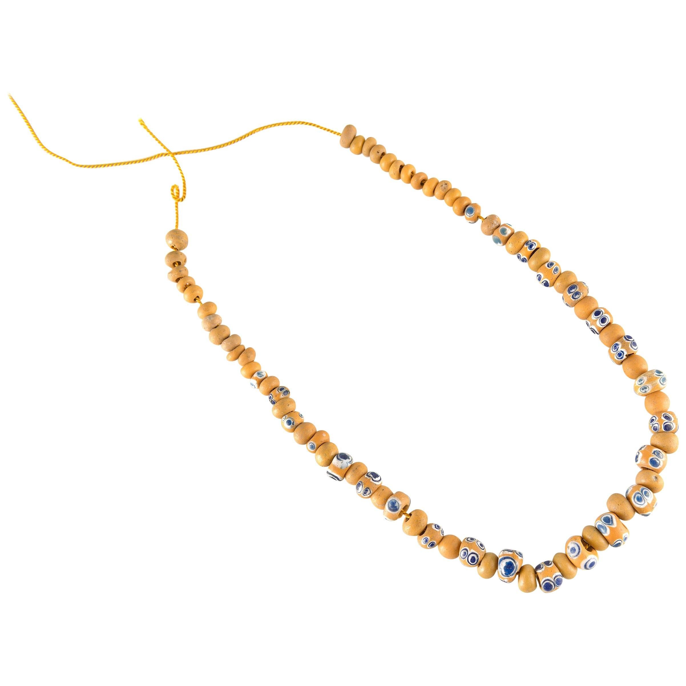 Ensemble Phoenician Yellow Glass Eye Beads, Fine Ancient Jewelry For Sale