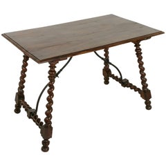 19th Century Spanish Renaissance Style Walnut Table with Forged Iron Stretcher