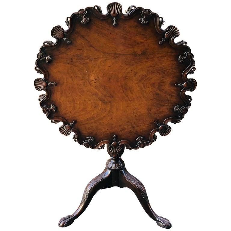 English Tilt Top Mahogany Table With Carved Top And Base Circa