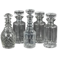 Vintage Collection of Ten Cut Glass Decanters of Various Forms and Makers.  