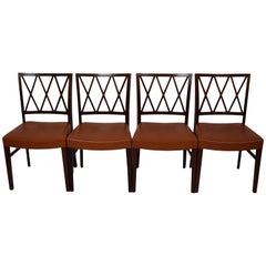 Four Danish Midcentury Rosewood Dining Chairs, Ole Wanscher, Leather Upholstery