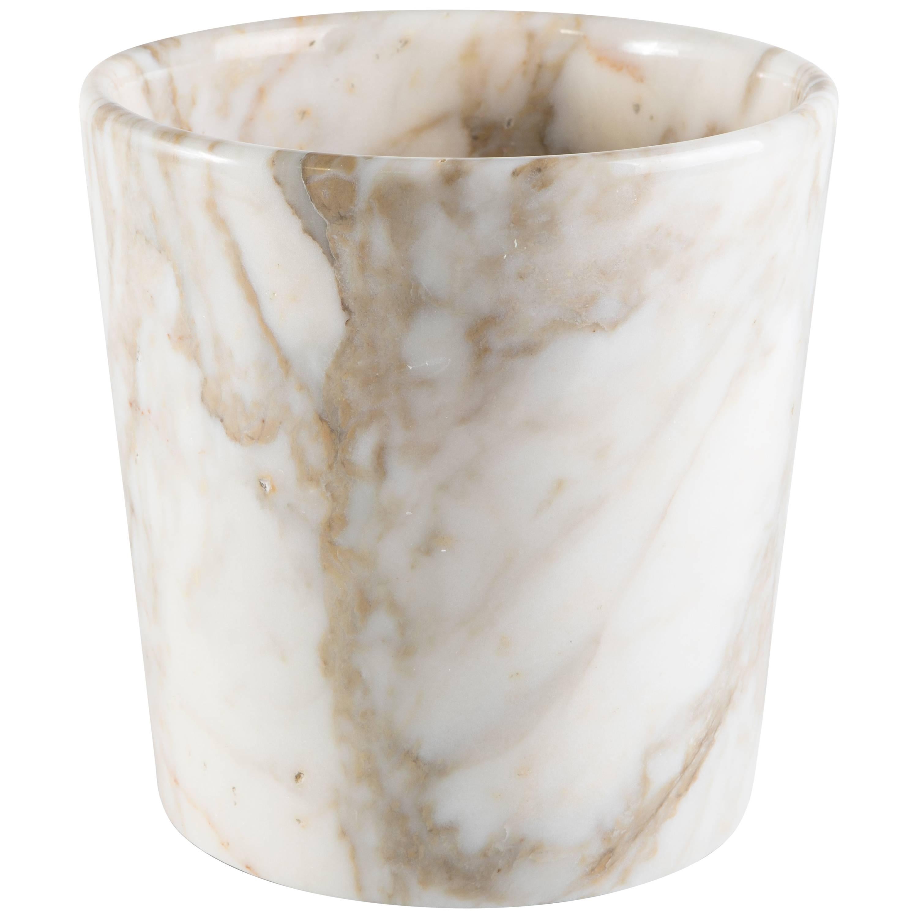 Vase with rounded edge in Paonazzo marble from Carrara. Each piece is in a way unique (since each marble block is different in veins and shades) and handcrafted in Italy. Slight variations in shape, color and size are to be considered a guarantee of