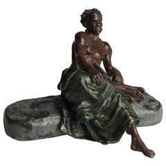 Vienna Bergman Bronze Black Man Seated with Rifle, circa 1900