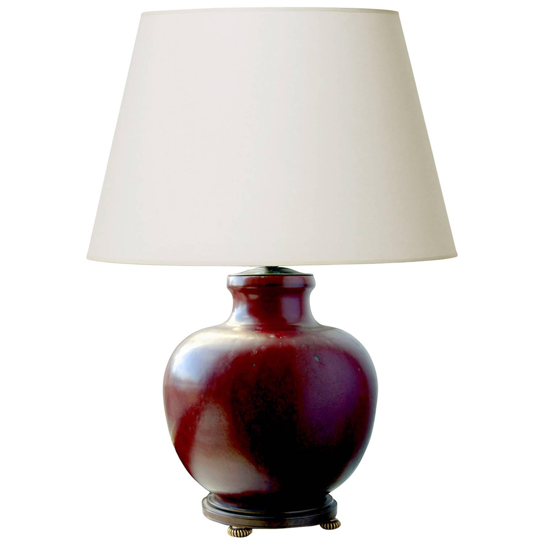 Oxblood Glazed and Bronze Mounted Table Lamp by Carl Halier for RC For Sale
