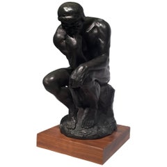 AUGUSTE RODIN Sculpture, "Le Penseur"Museum reproduction.
