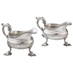 A Pair of George III Sauceboats by William Burwash in London in 1819.