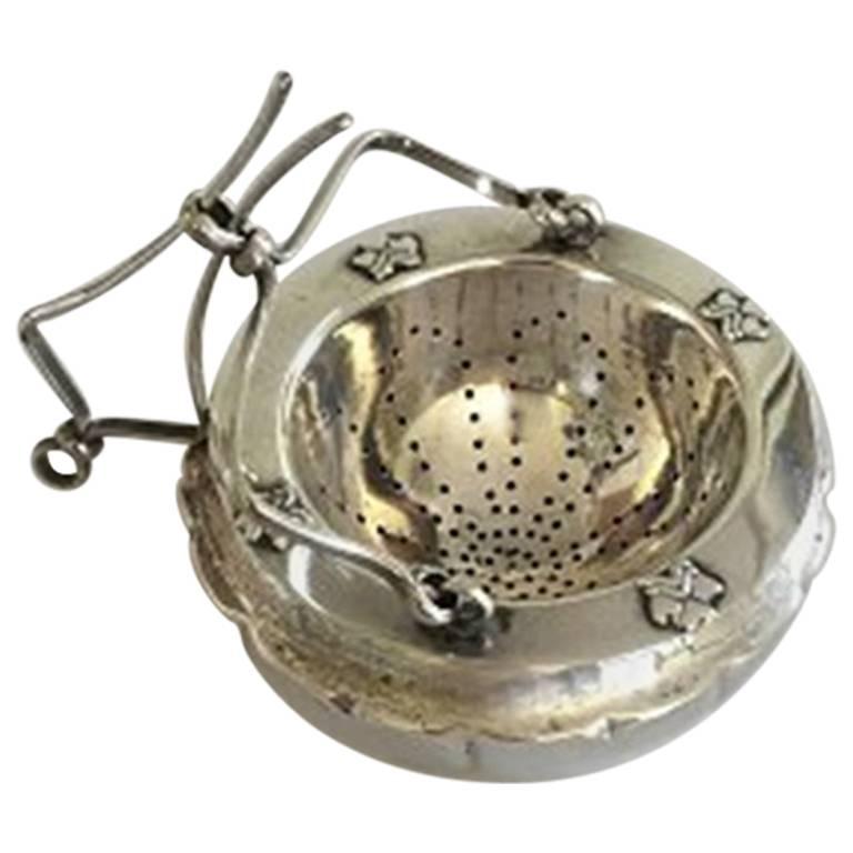 Danish Tea Strainer and Holder in Silver For Sale