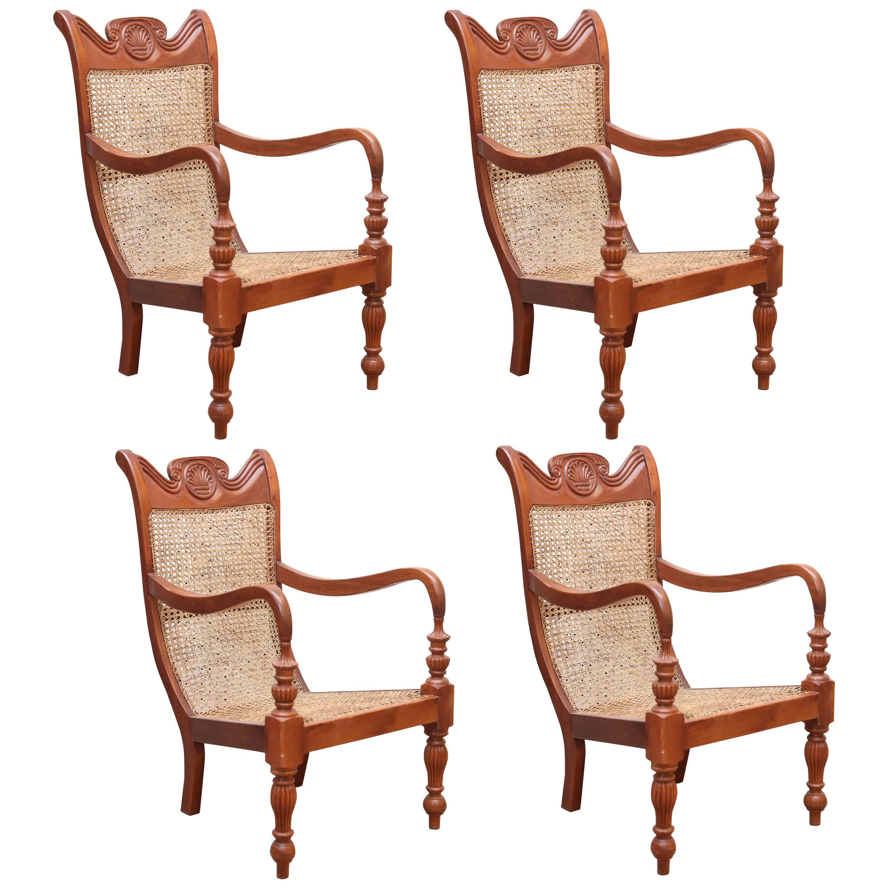 Set of Four Teak Wood and Cane Lounge Chairs from Colombo Area of Sri Lanka For Sale