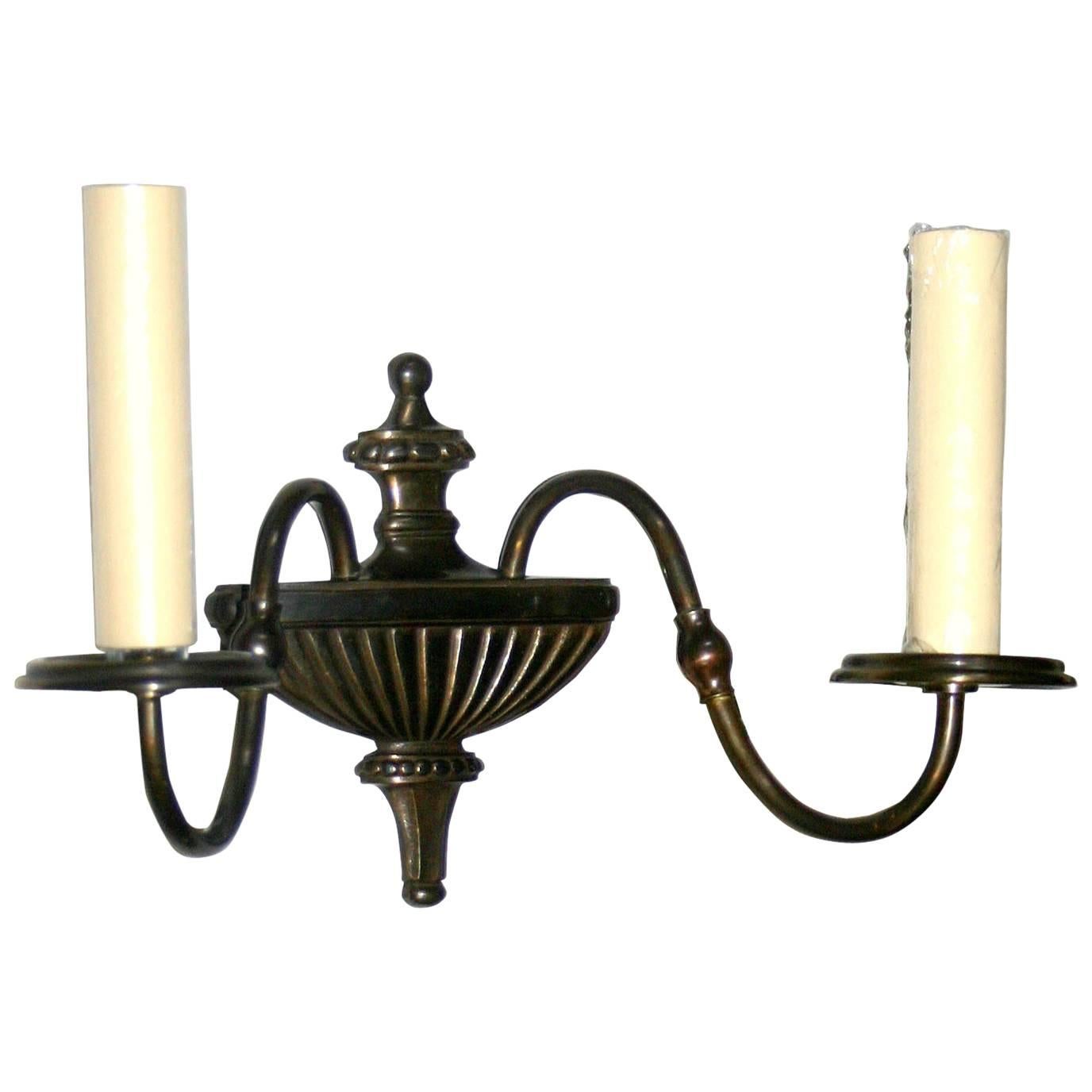 Pair of French circa 1920's Neoclassic style two-arm sconces.

Measurements
Width: 10.5