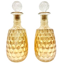 Mid-Century Pair Of American Blown Glass Iridescent Thumbprint Liquor Decanters