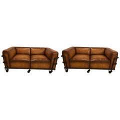 Pair of Industrial Style Sofas on Metal Frame Piping with Casters 