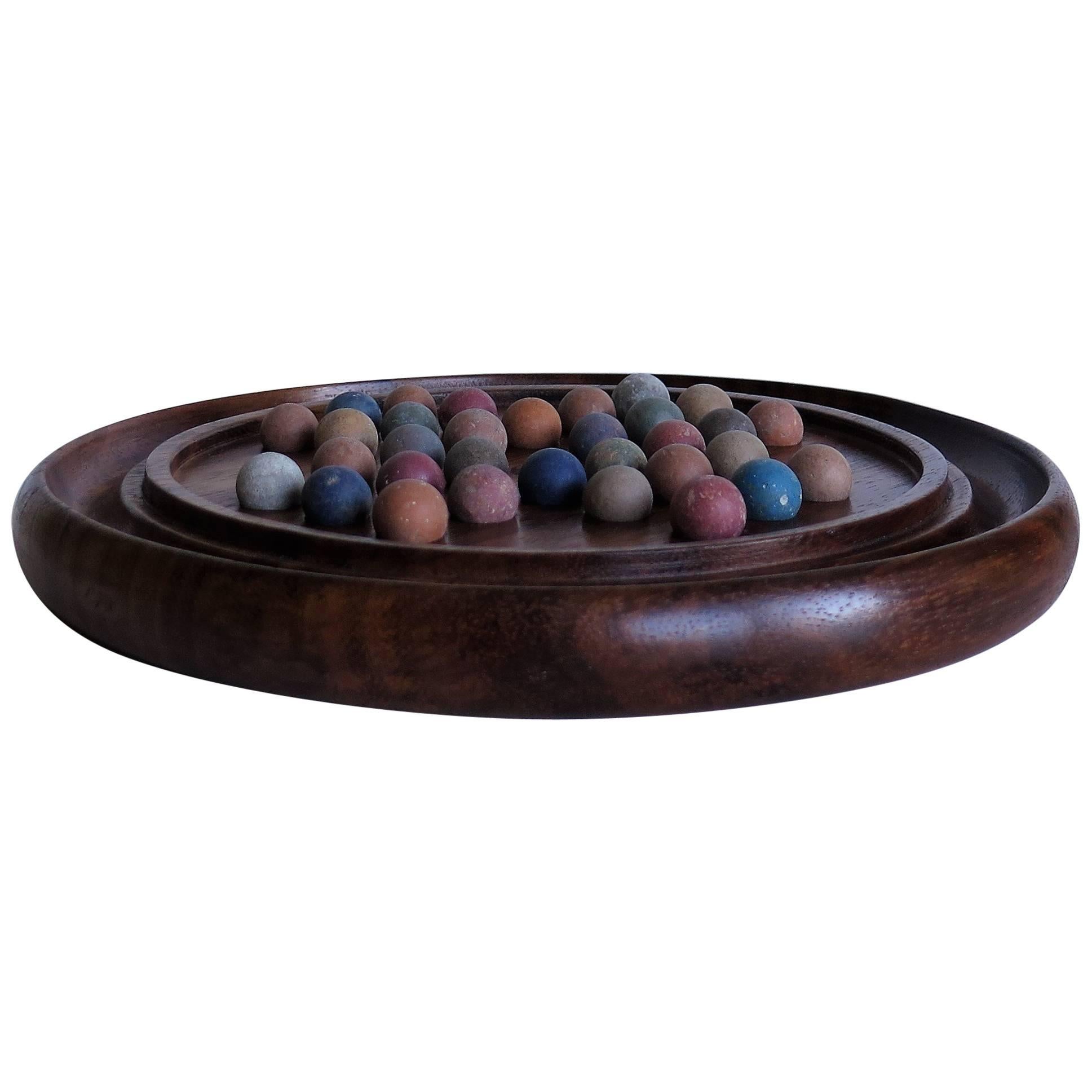 Edwardian Marble Solitaire Board Game, Mahogany board with Older Clay