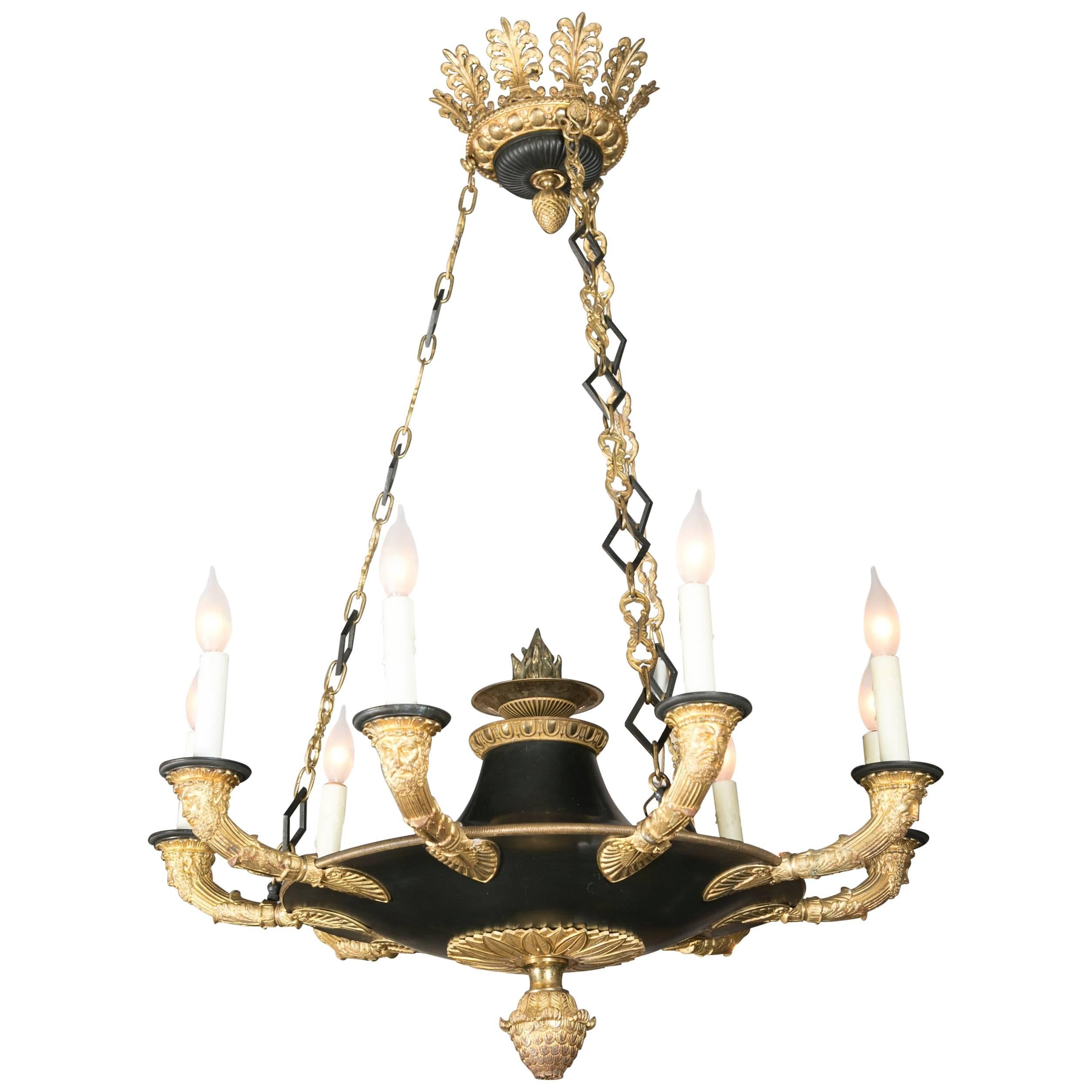 French D'ore Gilt and Patinated Bronze Nine-Light Chandelier For Sale