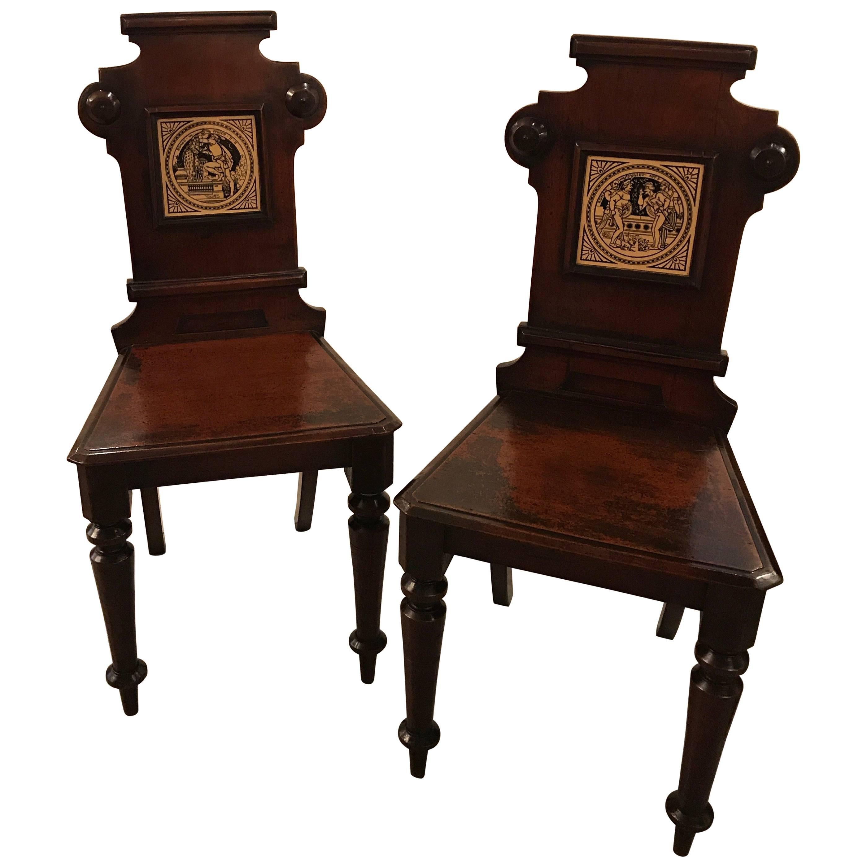 A pair of 19th Century English hall chairs with Minton Tiles