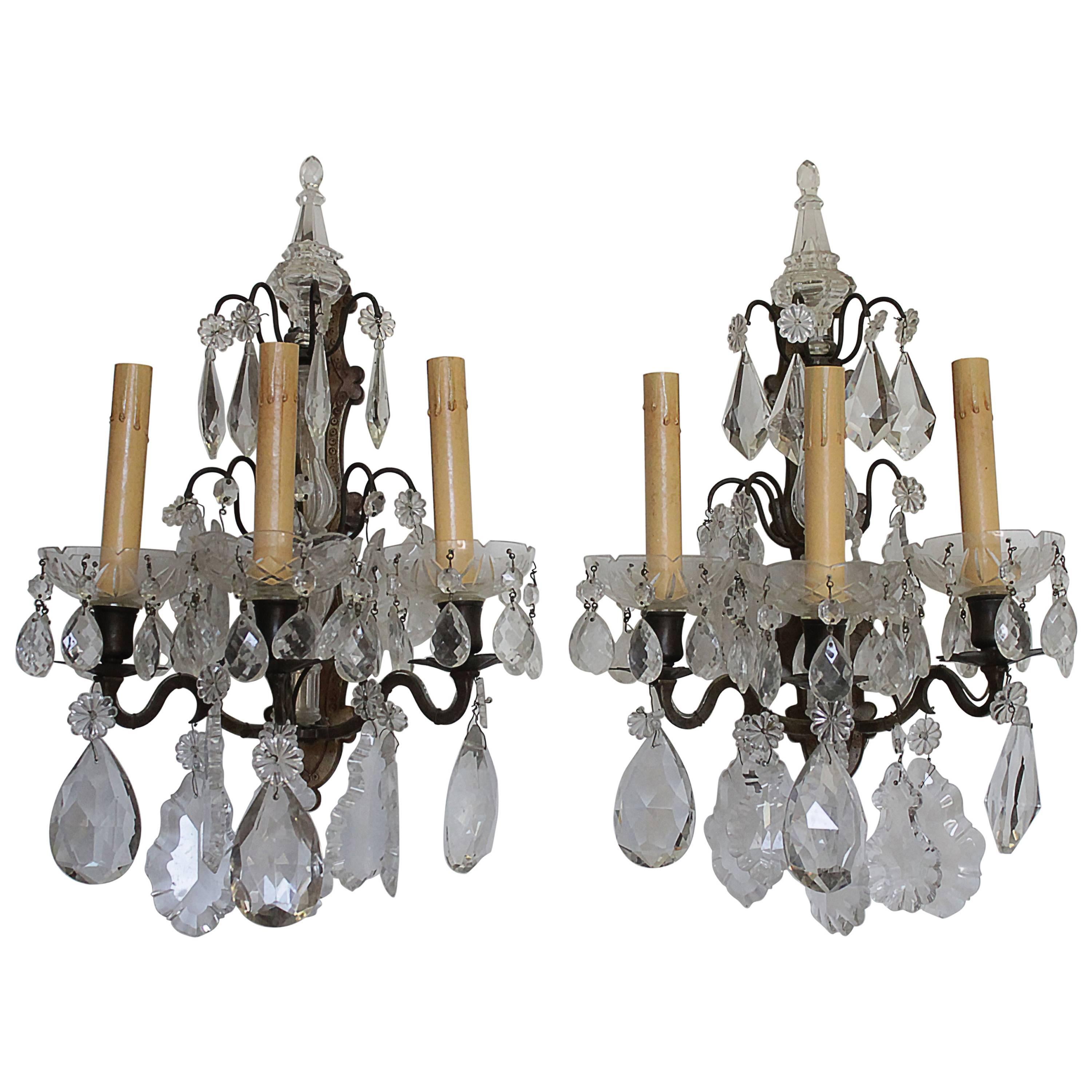 Pair of Bronze and Glass Crystal Sconces