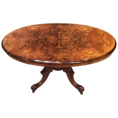 A beautiful small Victorian Period burr walnut oval coffee table.