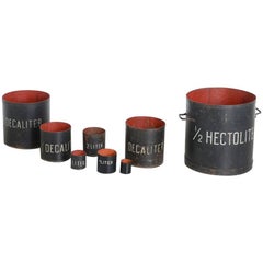 Decorative Set of 8 Vintage Metal Measuring Cups