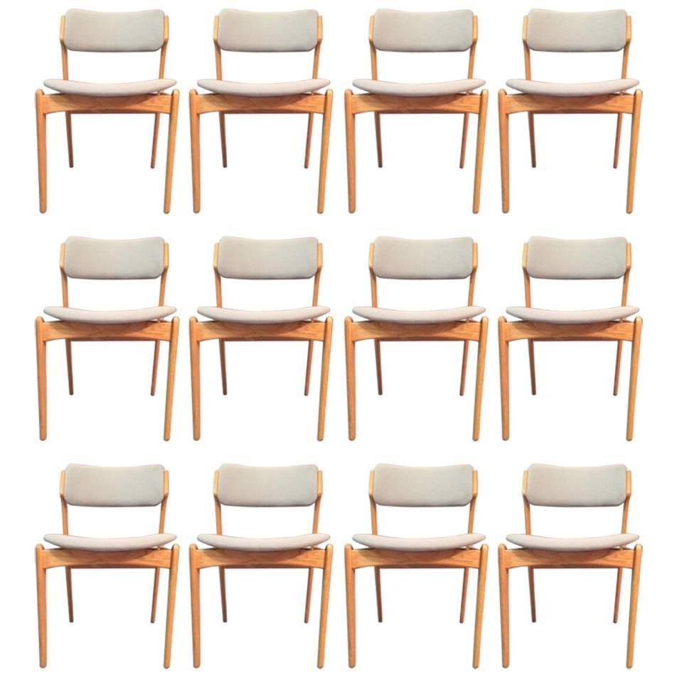 Twelve Fully Restored Danish Erik Buch Oak Dining Chairs inc. Custom Upholstery