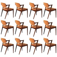 Twelve Restored Kai Kristiansen Rosewood Dining Chairs - Inc. Custom Upholstery