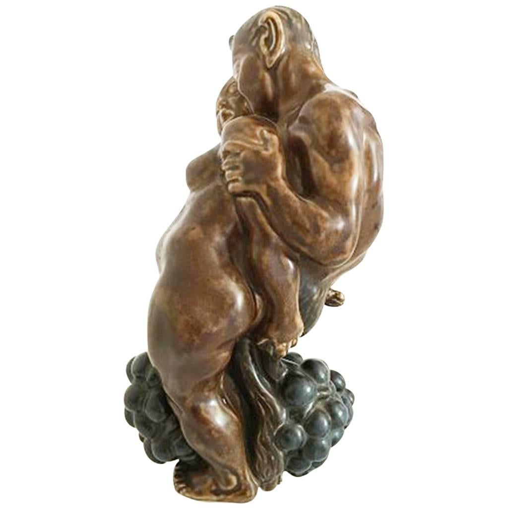 Kai Nielsen Stoneware Figurine No. 23 of Pan with Woman and Grapes For Sale