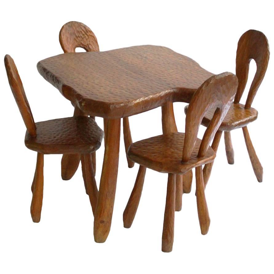 Table and Four Chairs in the Style of Atelier Marolles