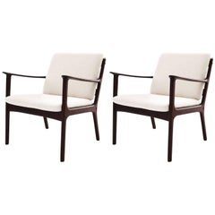 Ole Wanscher 1950s pair of “PJ112” model armchairs in Rosewood and Fabric