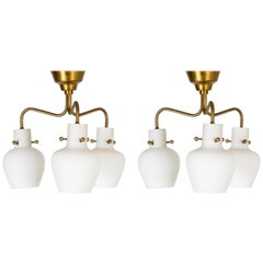 Pair of Brass and Opaline Chandeliers by Hans Bergström
